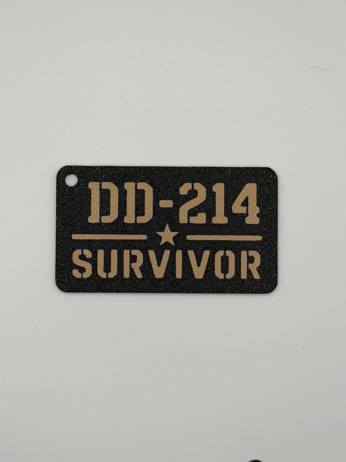 3D printed DD-214 Survivor veteran keychain in black and tan